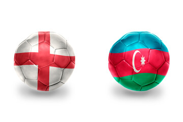 Obraz premium football balls with national flags of england and azerbaijan ,soccer teams. on the white background.
