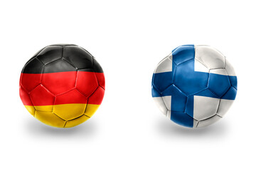 Obraz premium football balls with national flags of germany and finland ,soccer teams. on the white background.