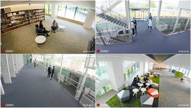 Security camera quad monitor screen interface.  Video of surveillance camera.