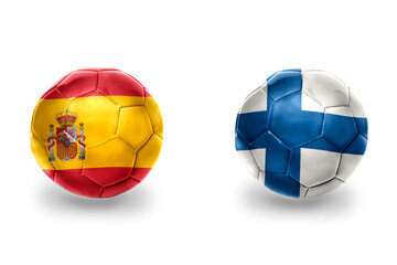 Obraz premium football balls with national flags of spain and finland ,soccer teams. on the white background.