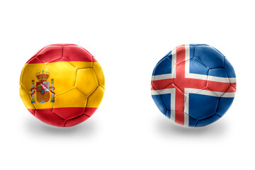 Fototapeta premium football balls with national flags of spain and iceland ,soccer teams. on the white background.