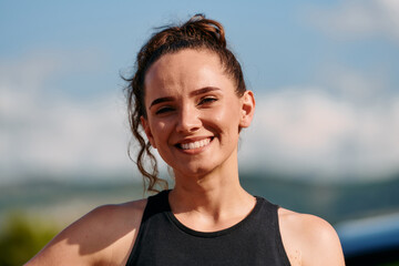 Radiant Athlete Close Up Portrait of a Woman Beaming with Joy.