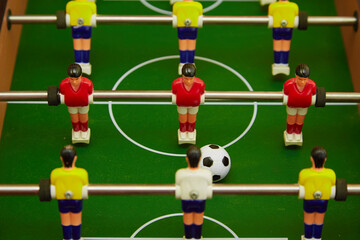 Foosball board game closeup, sports desktop foosball game
