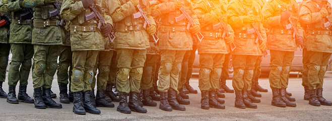 Army Soldiers In Uniform Standing In A Row On Parade Ground During Inspection