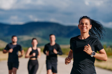 Leader Guiding Athletes on a Sunny Day Run
