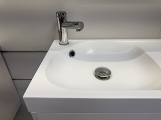 modern new sink and faucet in the bathroom