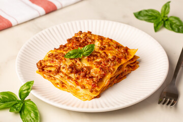 Homemade lasagna bolognese with meat ragu sauce, pasta or noodles, bechamel and cheese.