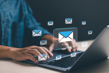 email marketing and New Email Notification concept, businessman using laptop computer to display...