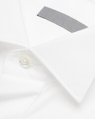 Classic white shirt wingtip collar with mother-of-pearl buttons