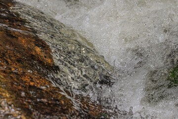 water flowing over rocks