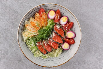 Salad with salmon, lettuce and balsamic vinegar. Healthy food, fresh green salad.