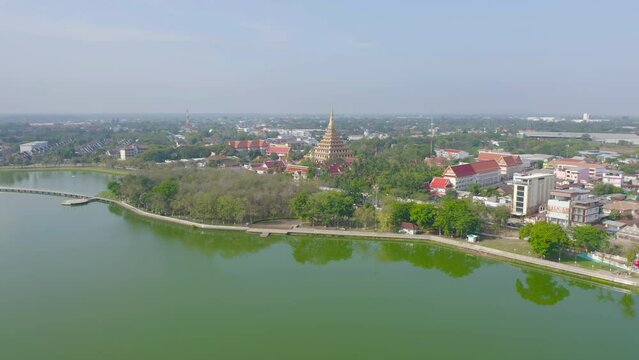 Aerial view of local residential neighborhood roofs. Urban housing development from above. Top view. Real estate in Isan, Khon Kaen urban city town, Thailand. Property real estate.
