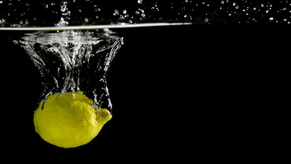 Fresh fruit falling into the water.
Organic fruits for making effective juices for dieting.