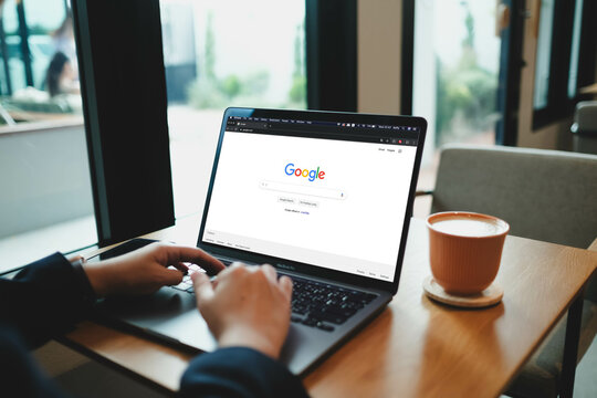  Bangkok. Thailand. JUNE 13,2024 :A woman is typing on Google search engine from a laptop. Google is the biggest Internet search engine in the world.