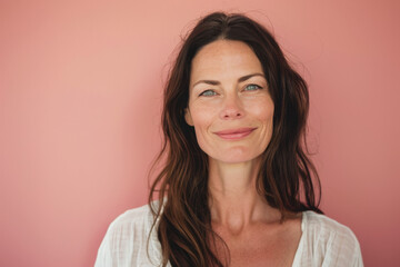 Fototapeta premium A close up portrait of a woman with a subtle smile