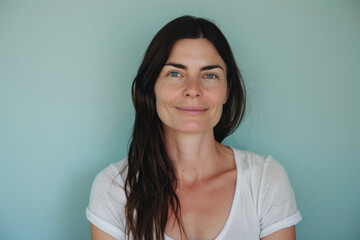 Fototapeta premium A close up portrait of a woman with a subtle smile