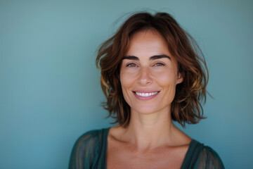Fototapeta premium A close up portrait of a woman with a subtle smile