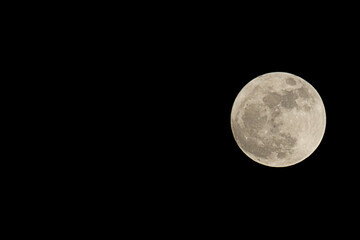 Full moon in black sky at night