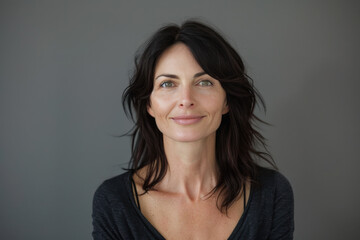 Fototapeta premium A close up portrait of a woman with a subtle smile
