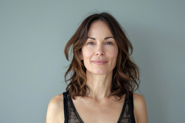 Fototapeta premium A close up portrait of a woman with a subtle smile