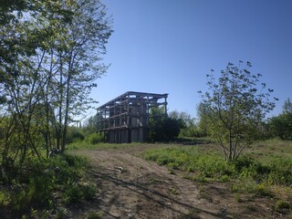 abandoned area industrial zone with old destroyed houses. stalker