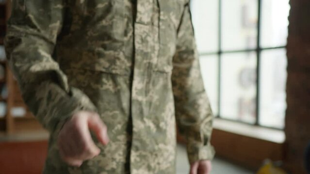 Unknown Caucasian male officer camouflage uniform guy man military army soldier veteran handshake arms psychologist businessman inside office cabinet psychology support healthcare war hero army forces