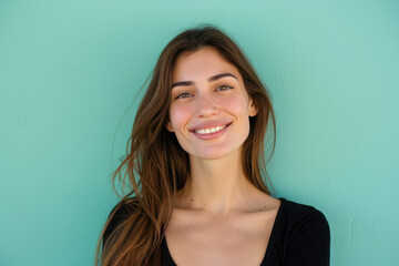 A close up portrait of a woman with a subtle smile