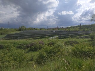 solar panels in the field. Industrial zone. Environmental energy
