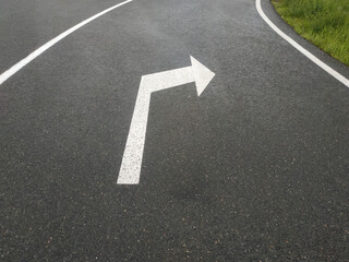 Road markings. White on gray and black. Abstract drawing art