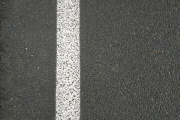 Fototapeta premium Road markings. White on gray and black. Abstract drawing art