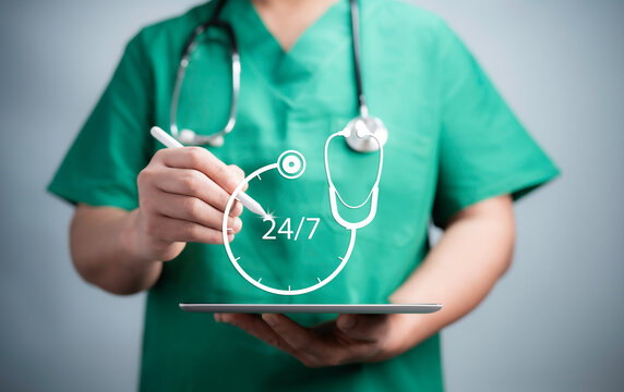 Medical worker touch 24-7 service icon for assistance patient when accident or emergency. Medical call center service with out interruption day and night.Pharmacy service 24 hours a day.Online medical
