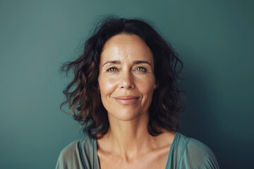 Fototapeta premium A close up portrait of a woman with a subtle smile