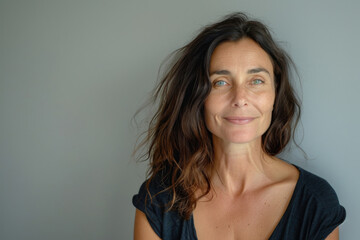 Fototapeta premium A close up portrait of a woman with a subtle smile