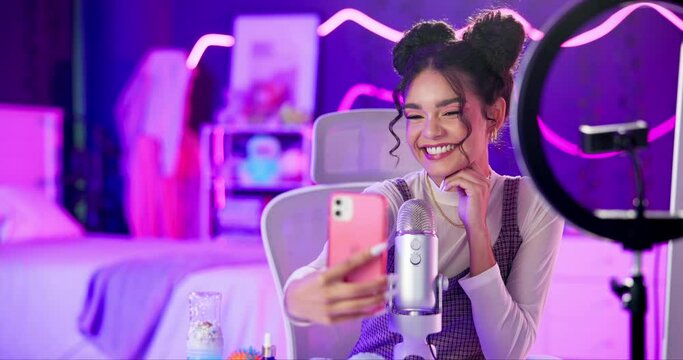 Woman, selfie or influencer in home with microphone, smile or pleasure for social media post online. Streamer, girl or content creator live streaming for picture or soft sound effects of nail tapping