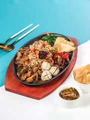 Indonesian chicken soup with noodles, turmeric and ginger (Soto Ayam). Indonesian beef noodles soup (Mie kocok). Seafood Fried Noodles (Mie Goreng - Malay style stir-fried noodles with spicy seafood.