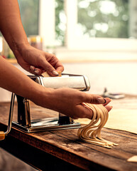Girl kneads dough in the kitchen and dreams