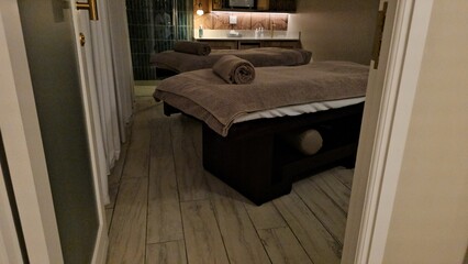 Two Beds and Towels in Room