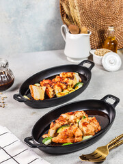 several foods such as seafood and noodles on the hotplate