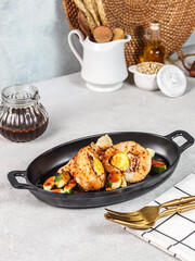 several foods such as seafood and noodles on the hotplate