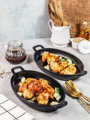 several foods such as seafood and noodles on the hotplate