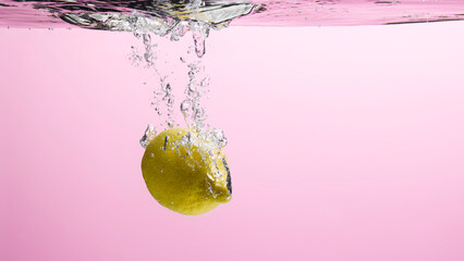 Fresh fruit falling into the water.
Organic fruits for making effective juices for dieting.