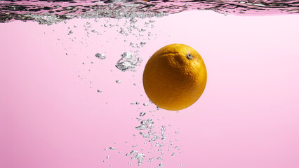 Fresh fruit falling into the water.
Organic fruits for making effective juices for dieting.