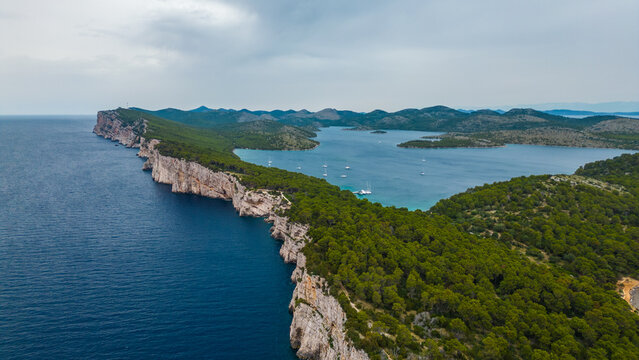 The nature park Tela&scaron;ćica(Telascica) on the island of Dugi Otok, Croatia, is home to some of the most spectacular seascapes, featuring dramatic cliffs towering above the azure sea captured by drone