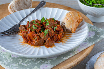 Braised beef stew in red wine and tomato sauce