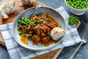 Braised beef stew in red wine and tomato sauce