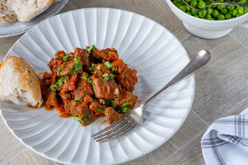 Braised beef stew in red wine and tomato sauce