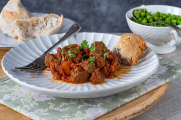 Braised beef stew in red wine and tomato sauce