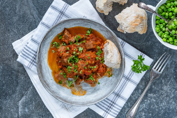 Braised beef stew in red wine and tomato sauce