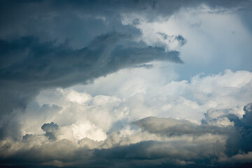 Beautiful stormy cumulus clouds in the sky, background.