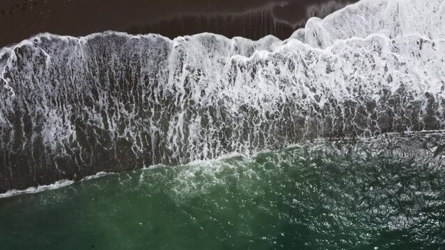Waves crashing on the shore.